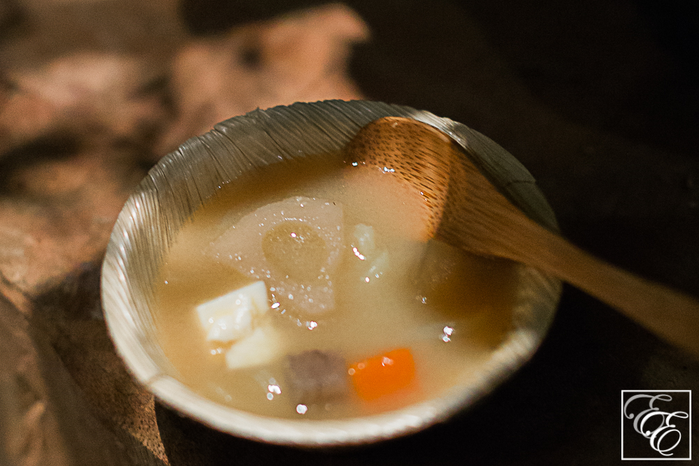 Vegetarian miso-sesame soup with millet konnyaku noodles, tofu, and lotus root