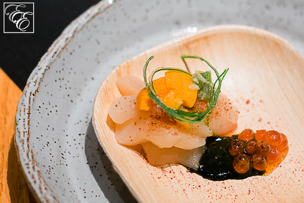 Hokkaido scallop with uni, ikura, fermented wasabi leaf, and nori ponzu