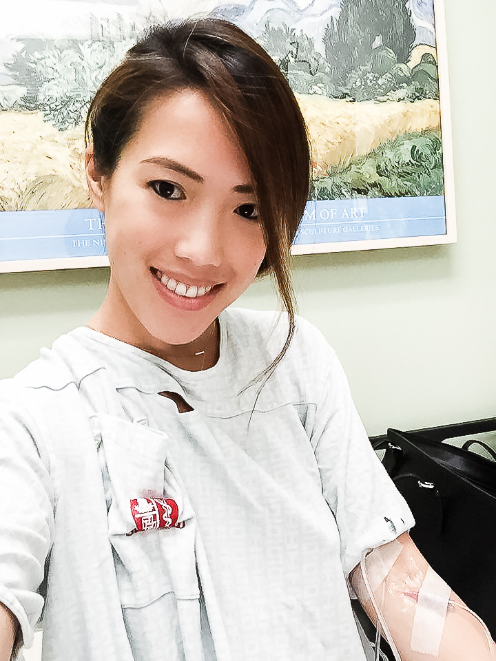 Smiling with excitement to get things going, despite my dislike of needles (of which I had to endure many through the process).