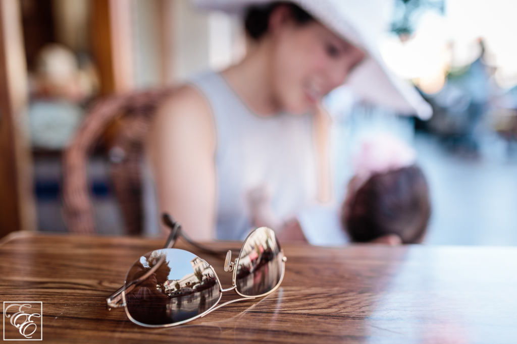 Post-pregnancy new mom style: loosely-flowing dress, wide-brimmed sunhat and sunglasses