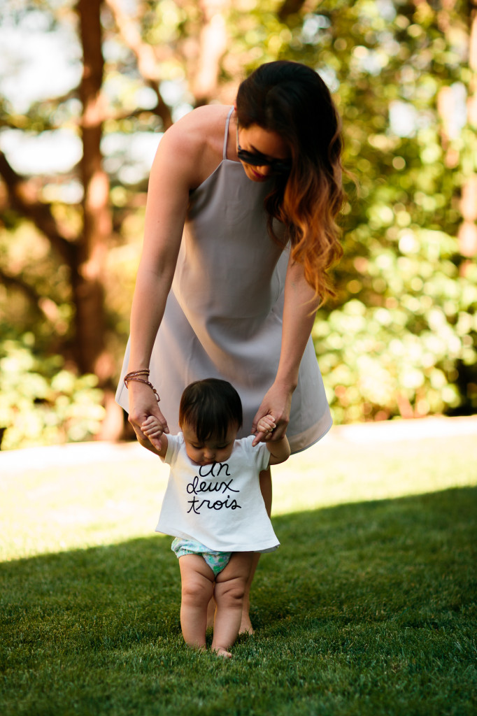 mama wearing Tobi shift dress, Bebe sunhat, Chanel glasses, baby girl wearing Joe Fresh top